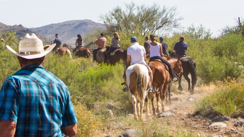1060 Capital, LLC team members riding horses