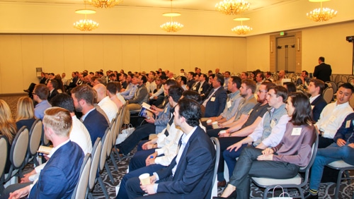 1060 Capital, LLC team member listening to a presentation