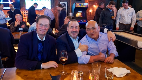 1060 Capital, LLC team members socializing at an event
